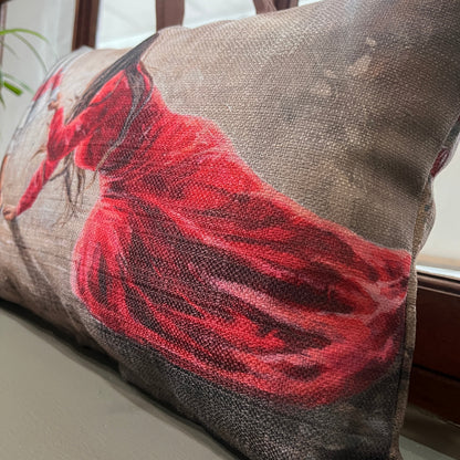 Decorative pillow with a red and black design on a chair Christian prayer cushion woman touching hem of Jesus