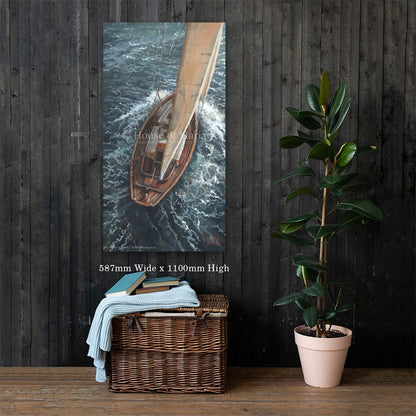 Oceans of Grace — a wooden sailboat under full sail seen from above by Maria Magdalena Oosthuizen, 587 x 1100mm canvas print on a dark wood wall | canvas print wall art | House of Maria