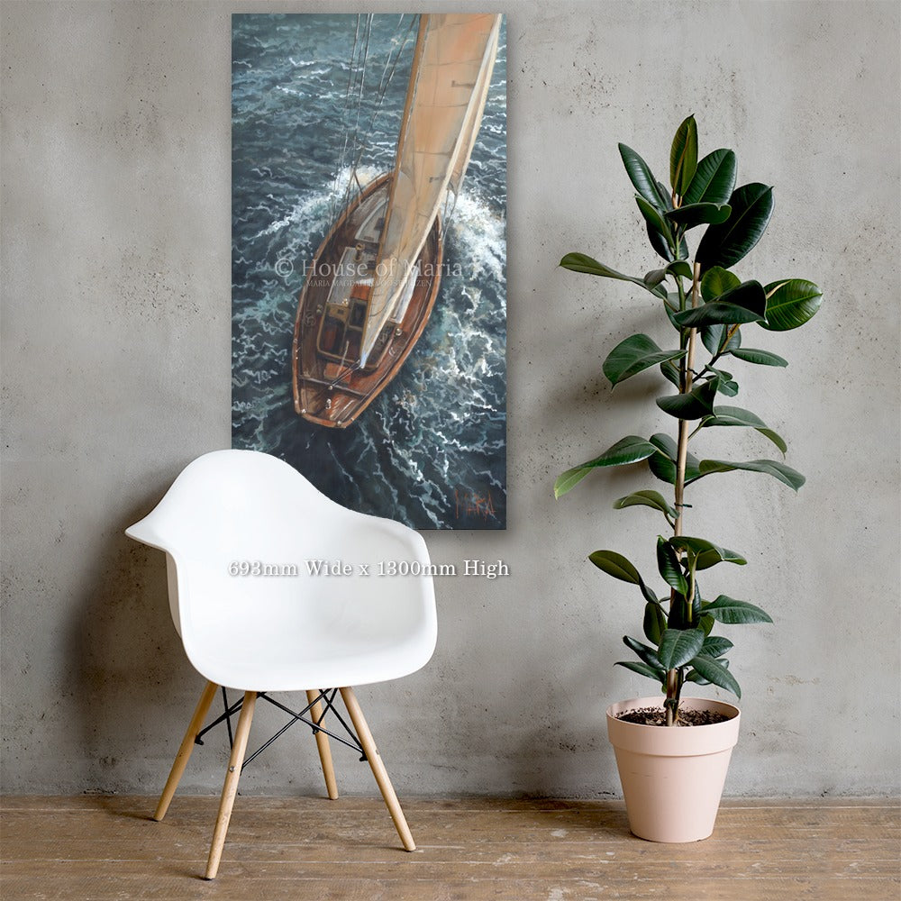 Oceans of Grace — a wooden sailboat under full sail seen from above by Maria Magdalena Oosthuizen, 693 x 1300mm canvas print on a grey wall | canvas print wall art | House of Maria