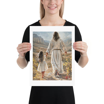 The Way Home — woman holding the A3 print of Jesus leading a little girl home by Maria Magdalena Oosthuizen | South African faith art | House of Maria