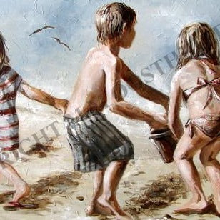 Three children playing on the beach